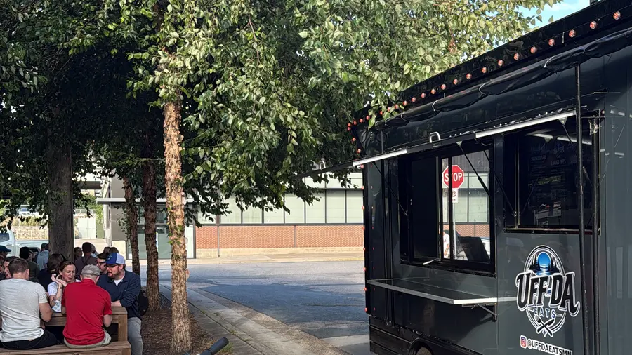 Uff-Da Eats serving at a brewery patio